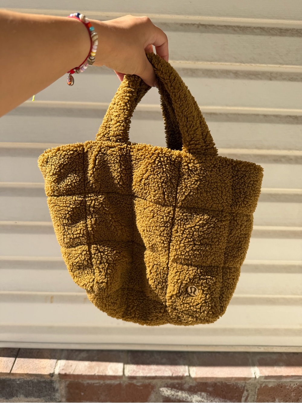 Lululemon quilted grid fleece crossbody bag in burnt Carmel 5L